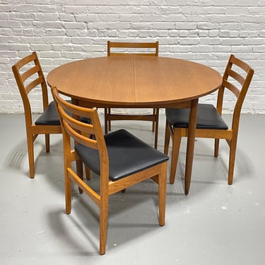 Mid Century MODERN Teak ROUND to OVAL Dining Table, Made in Denmark. c. 1960s 