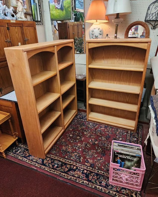 Wooden Bookcases. On left, $139. 47x10x60" tall. On right. 36x10x60" tall. Adjustable shelves. 