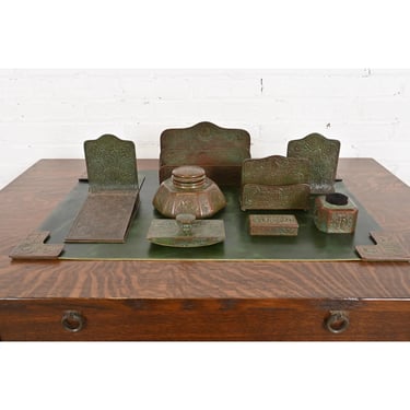 Tiffany Studios New York Zodiac Bronze Nine-Piece Desk Set, Circa 1910