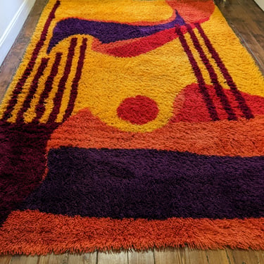 1960’s Scandinavian Rya in vibrant colors and abstract patterns, wool shag area rug. 