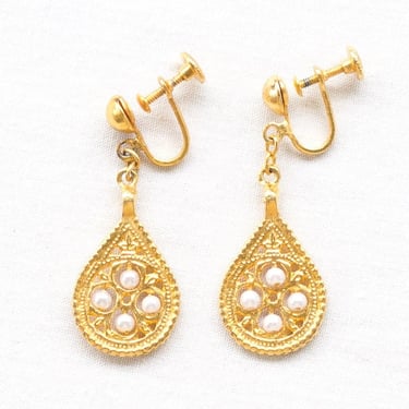 Gold tone teardrop dangle earrings with faux pearls 