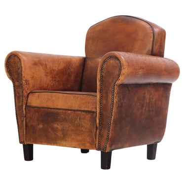 A Dutch Art Deco leather club chair, C 1940.
