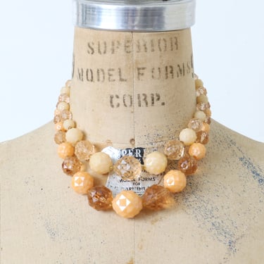 vintage 1960s multi-strand plastic necklace • peach bellini 