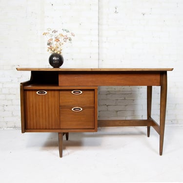 Vintage MCM floating Mainline walnut desk by Hooker furniture with 4 drawers and formica top | Free delivery in NYC and Hudson Valley areas 