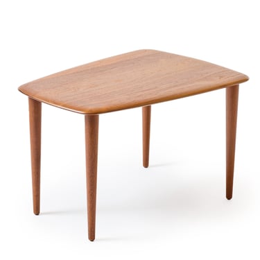 A wedge table on tapered legs in solid teak by Peter Hvidt &amp; Orla Mölgaard-Nielsen for France and Daverkosen, 1950's