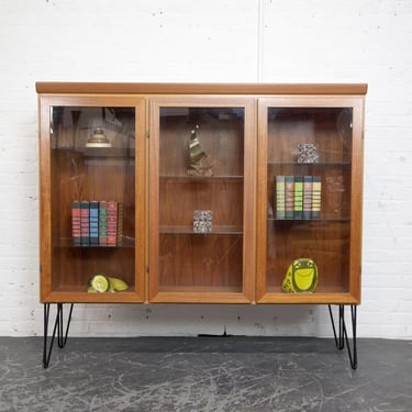 Vintage MCM teak bookcase storage cabinet with glass doors on hairpin legs by Skovby Denmark | Free delivery in NYC and Hudson Valley areas 