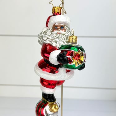 Christopher Radko Santa Balancing on Ornaments Glass Christmas Ornament CR 