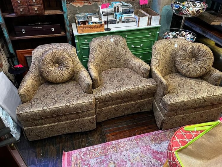 Three tan paisleyish swivel chairs. Two with button pillows! 25” x 30” x 29” seat height 16” 