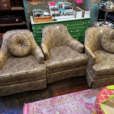 Three tan paisleyish swivel chairs. Two with button pillows! 25” x 30” x 29” seat height 16” 