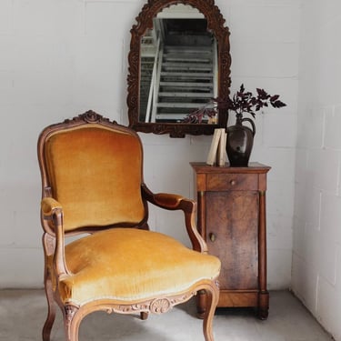 19th century Louis XV carved walnut and velvet armchair