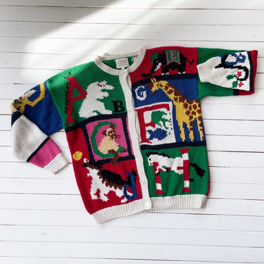 cute embroidered sweater 80s 90s vintage Susan Bristole alphabet navy blue teacher grandma novelty cardigan 