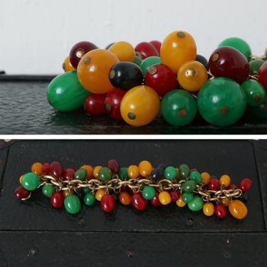 rare vintage beaded Bakelite charm bracelet • cherry red amber, butterscotch, green, black marbled loaded Bakelite piece 