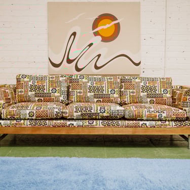 Vintage mid-century sofa with tiki fabric