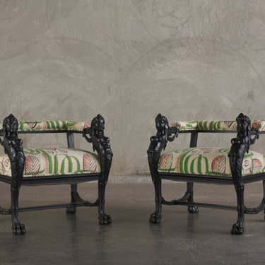 PAIR OF RENAISSANCE REVIVAL CARVED EBONIZED ARM CHAIRS C1880