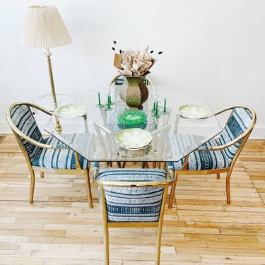 Brass + Glass Dining Table with Upholstered Chairs