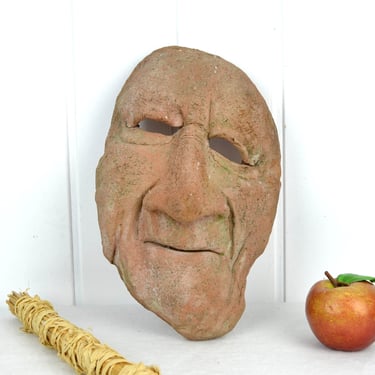 Wall mask by artist Helga Seum from Gedern mural grotesque grimace face wall plate ceramic studio ceramics handmade Design Pottery 