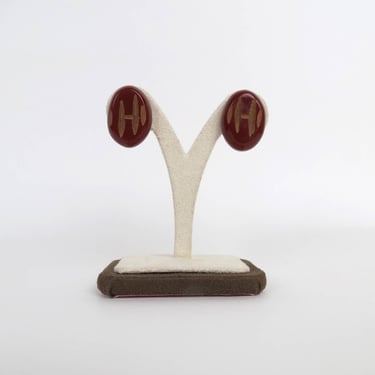 Vintage 1950s Bakelite earrings carved clip on brown rust mid century oval 