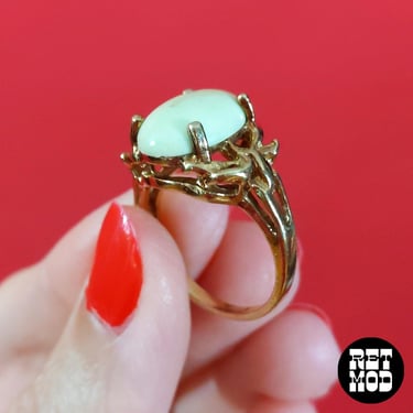 Vintage Off-White Oval Ring with Intricate Nouveau Setting 