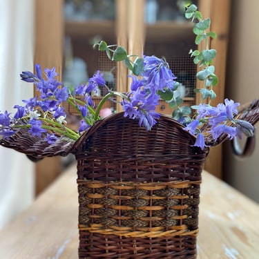 Beautiful vintage French farmhouse woven basket with metal and leather handles 