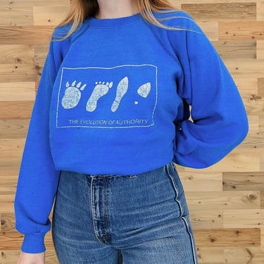 Soft Faded Vintage Feminist The Evolution of Authority Raglan Sweatshirt 