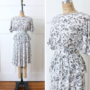 designer vintage 1990s does 1940s peplum dress • abstract print rayon black & white dress 