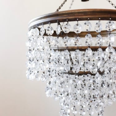 1950s French brass and crystal waterfall chandelier