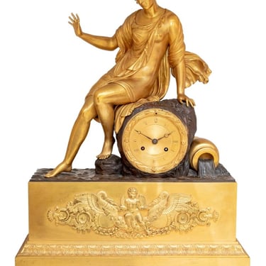 Charles X Gilt and Patinated Bronze Figural Clock