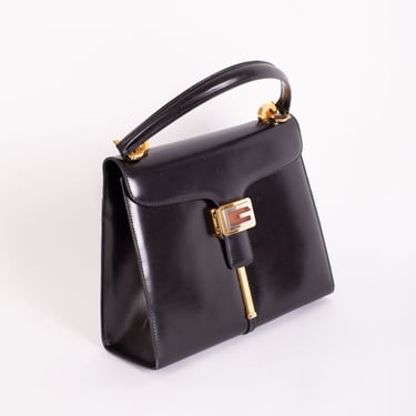 RARE 1960s Gucci Black Leather 'G' Twist Lock Bag with Silver and Gold Hardware 60s Lady Lock Kelly Top Handle Dead Stock 