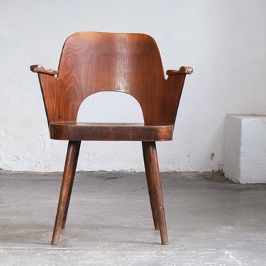 Mid Century armchair by Oswald Haerdtl in chestnut brown 