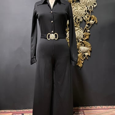 1970s jumpsuit, black polyester, vintage jumpsuit, medium, flared leg, long sleeve, mod, disco style, button front, collared, retro, 28 29 