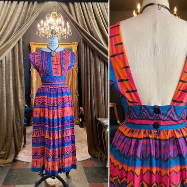 1980s dress, open back, vintage dress, geometric print, ethnic style, purple and orange, full skirt, midi dress, 28 waist, Howard wolf 