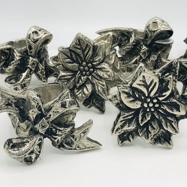 Vintage Set of  (8) Cast Metal Silver Ribbon and Poinsettia Napkin Rings-- Great Condition 