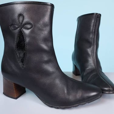 60s mod winter booties. Black leather heels with fur & pointed toes. Fur accents. By Buskens. (Size 6.5) 