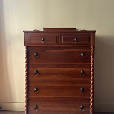 Walnut tallboy with lion head pulls