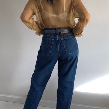 80s Levis jeans / vintage Levis 550 dark wash high waisted relaxed fit tapered straight leg blue jeans made in USA | 32 x 33 
