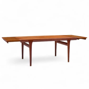 Kofod Larsen for Faarup Møbelfabrik Mid Century Teak Hidden Leaf Expanding Dining Table 