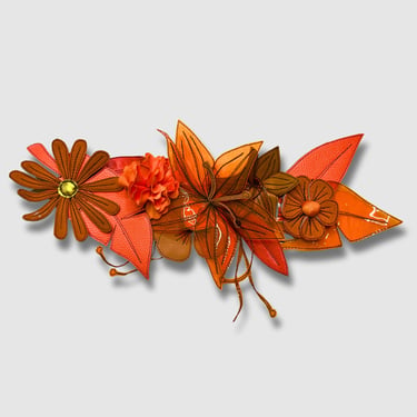 orange floral brooch