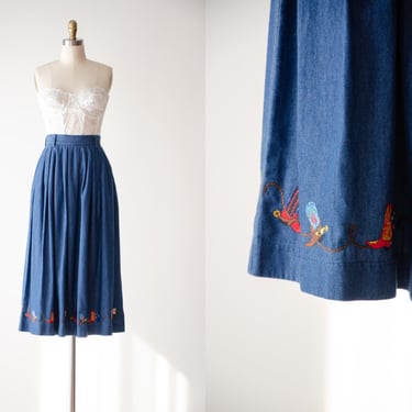 long jean skirt | 80s 90s vintage cowboy boot embroidered border print dark wash fit and flare denim midi skirt 