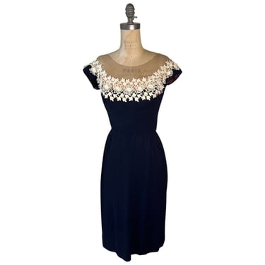 1950s black wiggle dress with mesh neckline 