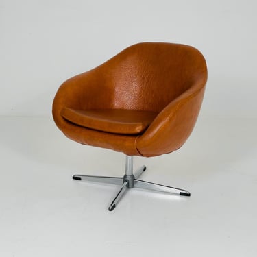 Mid-century Swivel cognac leather Cockpit armchair Germany 1970s 