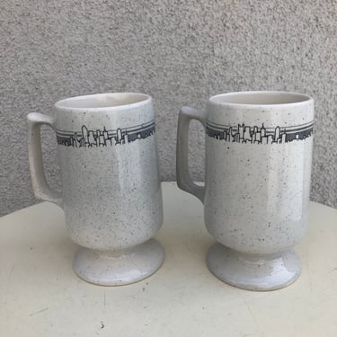 Vintage set 2 pedestal ceramic mugs Cityscape black line skyline theme by Buffalo China holds 9 oz 