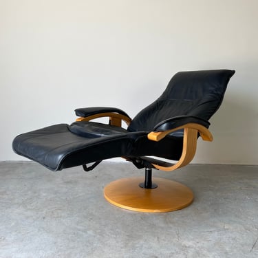 Danish Kebe Swivels & Reclines Leather Lounge Chair 