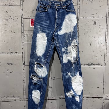 Distressed / Bleached Size 25x33 80s Lee riders medium wash denim blue Jeans. 