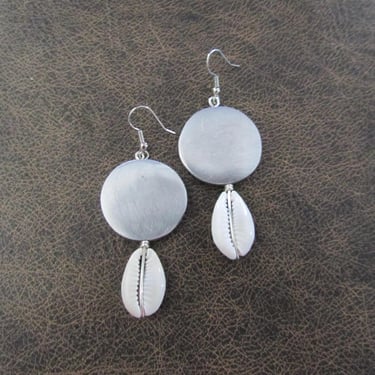 Minimalist mid century modern cowrie shell and silver earrings 