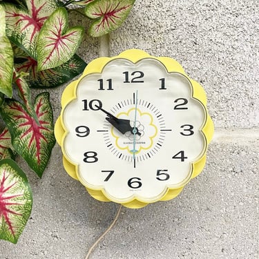 Vintage Wall Clock Retro 1970s Mid Century Modern + General Electric + Flower Shaped + Baby Yellow + Plastic + 7 Inch + Time + Wall Decor 