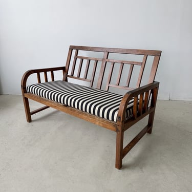 ANTIQUE ARTS AND CRAFTS WOOD & CANE BENCH WITH STRIPED SEAT CUSHION