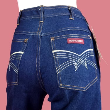 Deadstock 80s designer jeans. Lite STRETCH high rise slightly tapered dark denim embroidered disco pockets. (28 x 28 1/2) 