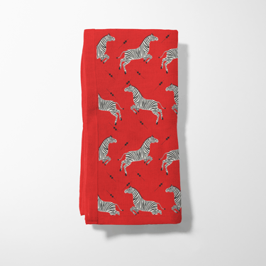 Leaping Zebras in Poppy Napkin in Lightweight Linen