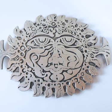 Don Drumm Cast Aluminum Sun Face Trivet 