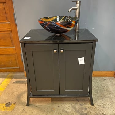 Black Vanity with Decorative Glass Vessel Sink